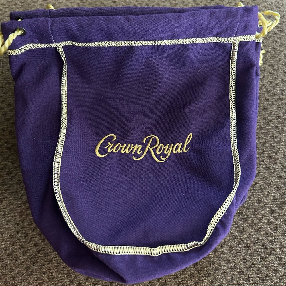 Bundle of 11 purple Crown Royal bags.